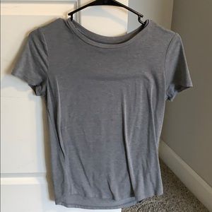 Grey t-shirt.